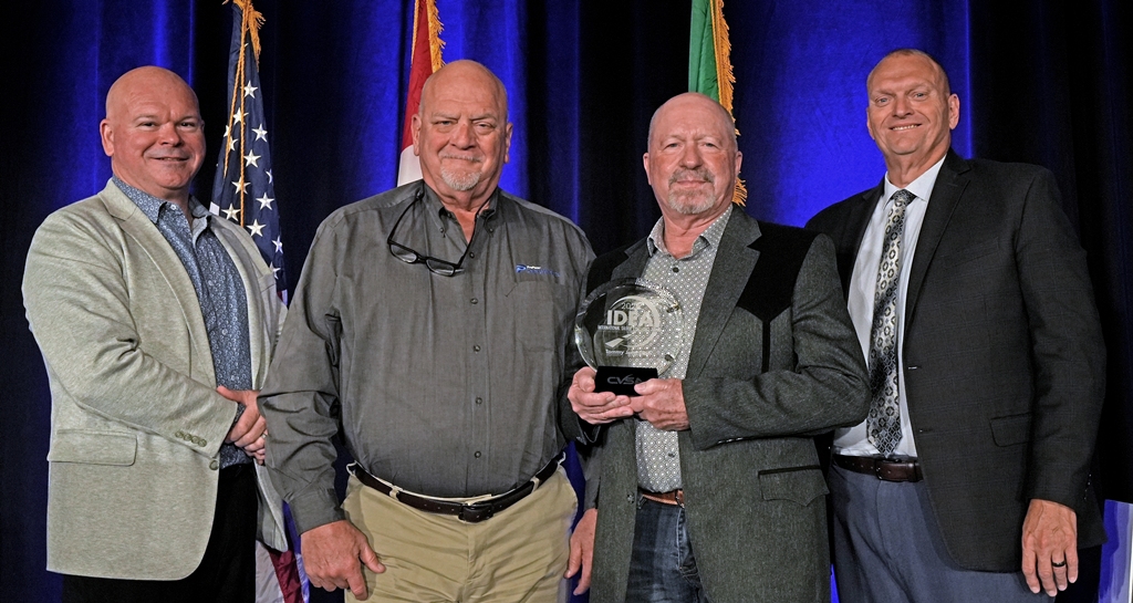 CVSA's tweet photo. International Driver Excellence Award recipient Tommy Cash with CAST Specialty Transportation received his award at our annual conference. L to R: CVSA President Maj. Erick McGuire; IDEA Chair Paul Claunch with @PrePass; Tommy Cash; and Maj. Jon Smithers with @IndStatePolice. https://t.co/8YyqsGHvRD