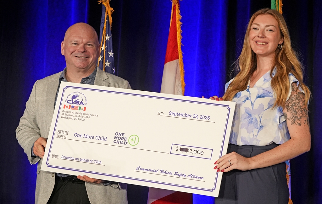 CVSA's tweet photo. CVSA President Maj. Erick McGuire with @FLHSMV selected @One_MoreChild as the recipient of funds raised by our members at the annual conference. We're proud to announce that we raised $5,000 which will be used to provide services to vulnerable children and struggling families. https://t.co/EmFohA1Kua