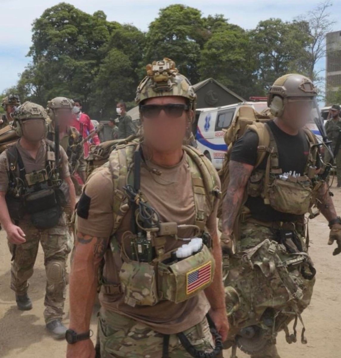specialopsmag's tweet photo. Force Recon Marines, US Army SF, and Air Force PJs in Venezuela during earthquake relief efforts in 2026.

Some individuals online have stated their displeasure regarding the Norse valknut helmet patch in the second and third photo, connecting it to "white supremacy." https://t.co/R8J1mLpZiP