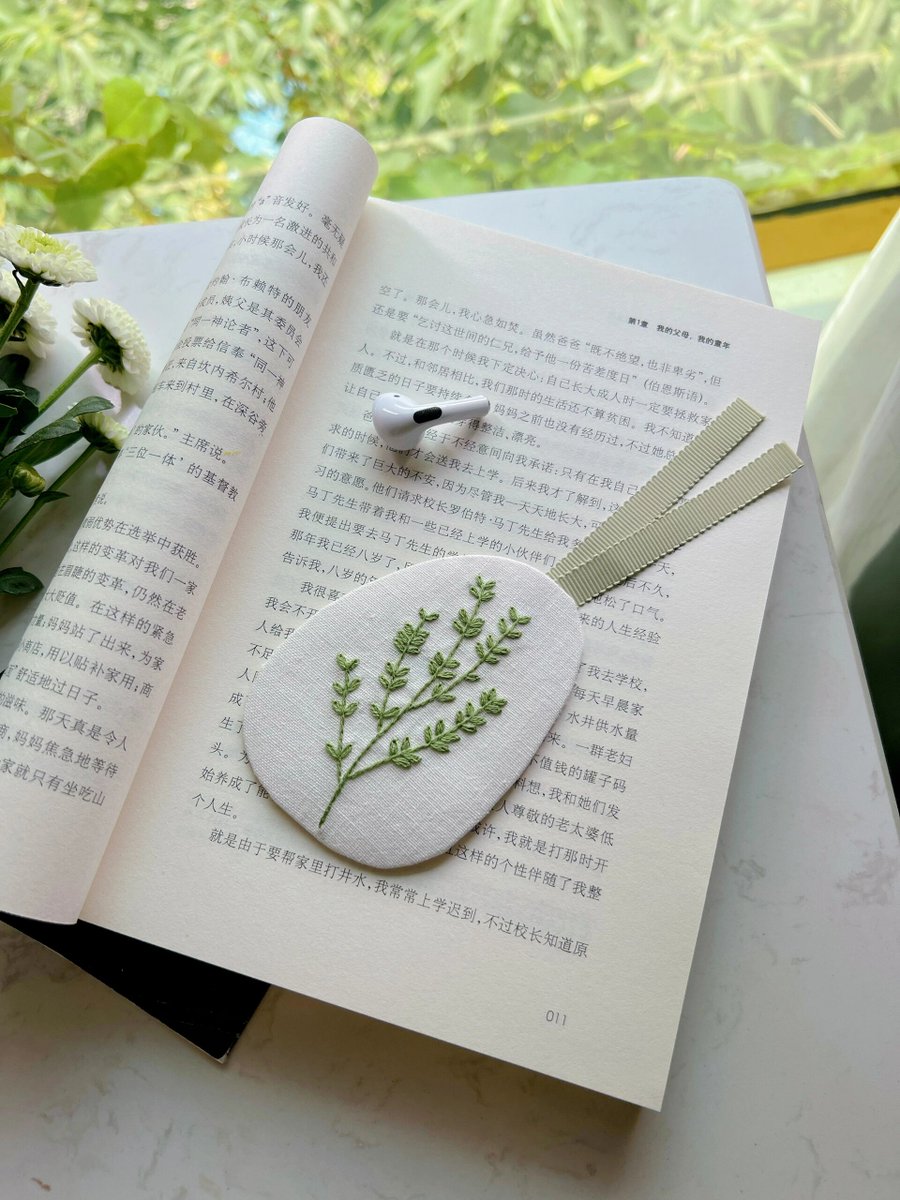 AnnieSawinof's tweet photo. Just finished my first hand-stitched linen bookmark  Slow craft, big joy! The tiny stitches took way longer than planned, but seeing it turn out so cute makes it all worth it. https://t.co/HDQEDCwmxo
