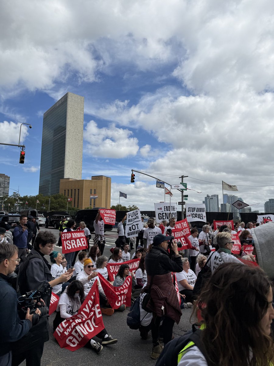 whatis1784's tweet photo. Two scenes from New York City just a few hours ago. A few deranged nobodies at the UN. And a pali-Nazi swastika just to show they don’t just hate Jews. https://t.co/CvfqpDDJTG