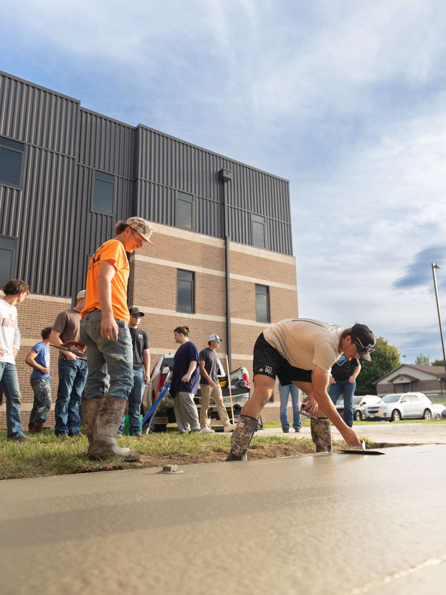 sfccmo's tweet photo. SFCC Construction Management students, pictured with instructor Logan Carter, poured concrete for new bike racks outside the Campus Housing Complex. Thank you to everyone who helped make this hands-on project possible! 👷🚲 https://t.co/bQQQ35ji5C