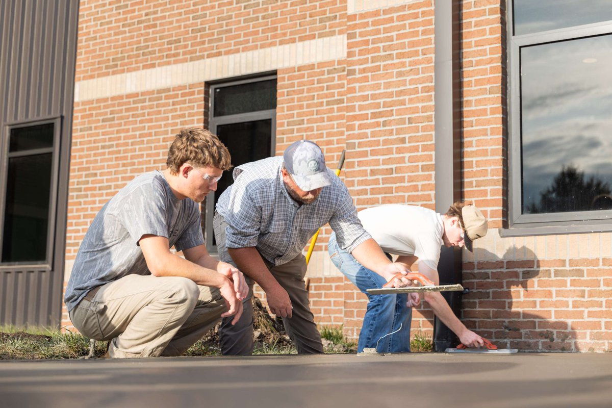 sfccmo's tweet photo. SFCC Construction Management students, pictured with instructor Logan Carter, poured concrete for new bike racks outside the Campus Housing Complex. Thank you to everyone who helped make this hands-on project possible! 👷🚲 https://t.co/bQQQ35ji5C