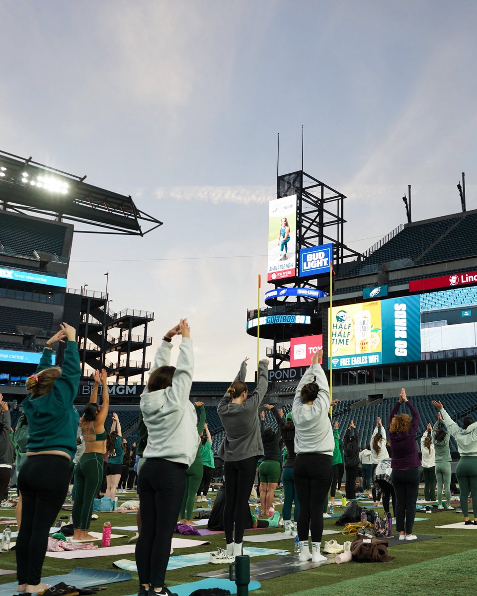 LFFStadium's tweet photo. Can cross this off the bucket list!🧘‍♀️

Yesterday, we hosted a gridiron-wide yoga class hosted by Eagles Cheerleaders ON the field at Lincoln Financial Field🙌 Thanks to everyone who came out, and to @IBX for putting on this incredible event‼️ https://t.co/pgJjDzLdvd