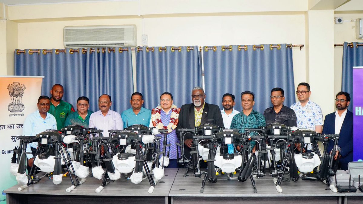 HCI_Suva's tweet photo. 🇮🇳🤝🇫🇯 #VeilomaniDosti 

High Commissioner Suneet Mehta formally handed over 12 agricultural drones, gifted by the Government of India to the Fiji Sugar Corporation (FSC), to Hon. Tomasi Tunabuna, Minister for Agriculture, Waterways & Sugar Industry, in Lautoka. 

The handover fulfils a commitment announced during the visit of Hon. Prime Minister @slrabuka to India in August 2025, and reflects the longstanding and multifaceted India–Fiji partnership in agriculture and the sugar sector. From seeds and mobile soil-testing laboratories to specialised training for Fijian sugarcane farmers at the National Sugar Institute in Kanpur under ITEC, India’s support combines technology, knowledge and capacity-building.

The 12 drones will support more efficient, technology-enabled and sustainable sugarcane production in Fiji. India remains committed to working alongside Fiji to advance agricultural innovation, productivity and resilience, while strengthening our enduring partnership for the benefit of Fijian farmers and communities. 

@MEAIndia @IndianDiplomacy @PIB_India @DDNewslive @WIONews @ANI @FijiGovernment @FijiAgriculture @MinistrySugar @FijiSugar