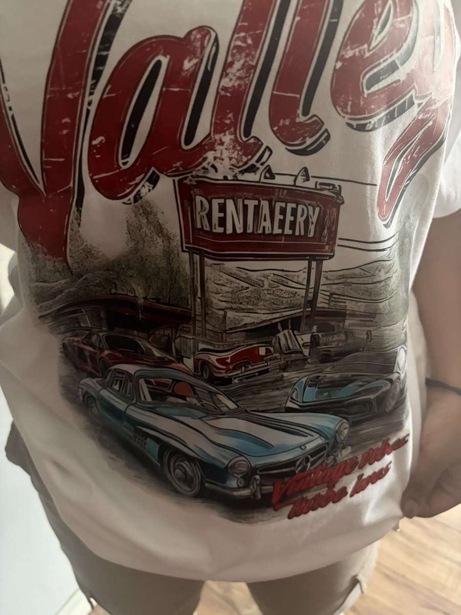 CROIMAN0R's tweet photo. AI-generated shirts bro you can’t make this stuff up https://t.co/npGMjTNnYj