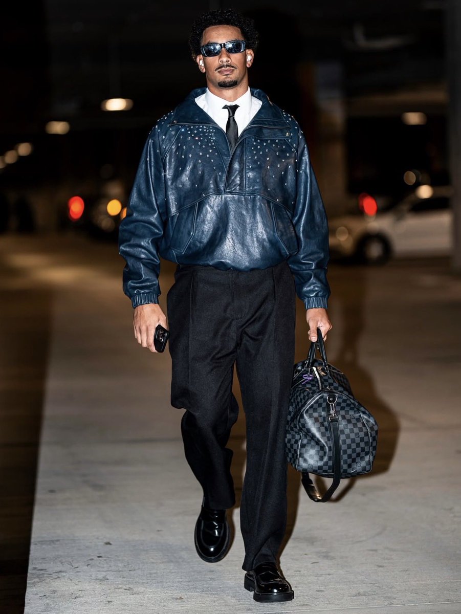 LegendaryLade's tweet photo. Green Bay Packers QB Jordan Love wearing Public School SS 2027 custom leather hoodie with diamonds by Kay Jewelers! 💎 https://t.co/Lw3aqFISsj