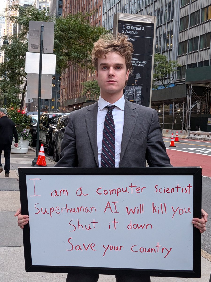 matthewktromp's tweet photo. Day 1 of standing outside the UN with a big sign until something happens

This worked extremely well

- I had probably 50 people with UN or Press badges take pictures with/of me
- gave an interview with one journalist and my contact information to another
- someone with a very large entourage read my entire sign
- met Alex Bores on his way to a meeting about AI

The attitude from people I met was almost universally sympathetic. People are worried

Good day