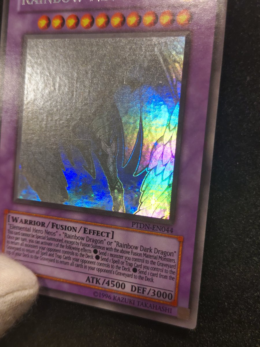 VolvoFlunk's tweet photo. 久しぶりの購入品紹介

『RAINBOW NEOS』
PTDN-EN044 ghost rare

これはヤバい！
虹色の色彩変化が美しすぎる✨
さすが《RAINBOW》NEOS！！

私のスマホスペックが弱いせいで画像では良さの１割ぐらいしか表現できていません。

これは実物を観て欲しい✨✨ https://t.co/rgQxMbUQaB