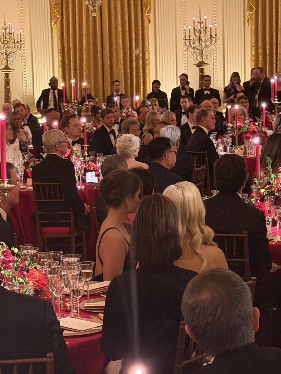 Emilylgoodin's tweet photo. For the record - here are the guests at the head table: President Trump, first lady Melania Trump, President Xi Jinping.l, Madame Peng Liyuan, Elon Musk, Apple’s Tim Cook, Nvidia CEO Jensen Huang and his wife Lori. Rounding out the head table were two Chinese officials. https://t.co/pRbxFpAv2L