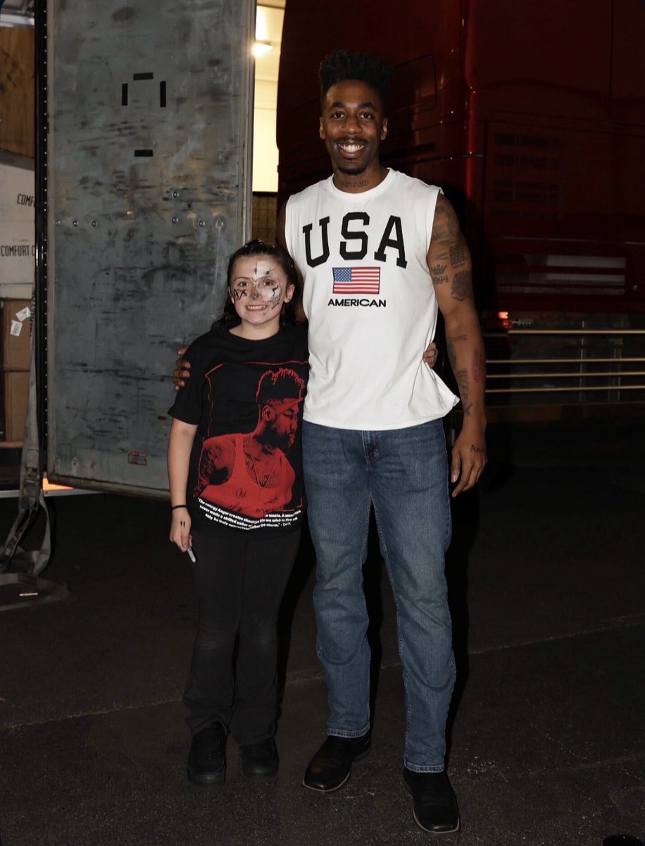 thatsdax's tweet photo. This is Grace. She is 12 years old and an ABSOLUTE LEGEND! During my show last night in West Springfield, Massachusetts we realized there was a little girl upfront doing Sign Language to every single song while also knowing all the words. I was shocked and had to meet her. After the show we brought her and her family back and what I found out was AMAZING. First off, her energy was infectious. I had just finished performing, then signing merch and taking pictures for over an hour and a half. I started walking towards them and saw how excited Grace was. Her energy genuinely made me feel like I took an energy drink lol. Next, I found out Grace had only started learning Sign Language 1 YEAR AGO. INCREDIBLE. Her mother said she’s self taught and has learned to use the hyper fixation that can come from ADHD on positive tasks. INCREDIBLE! She also plays football with the boys. I told her I couldn’t condone that one cause I quit and stuck with basketball once we started tackling lol. Anyways, these types of interactions remind me why I take so much time to write my lyrics. The youth are listening. Thank you to Grace’s mother and all the other parents who allow their children to listen to my music and bring them to the shows. I don’t take it for granted! The Anger Management Tour has been amazing! 37 More shows. Can’t wait to meet more of you.