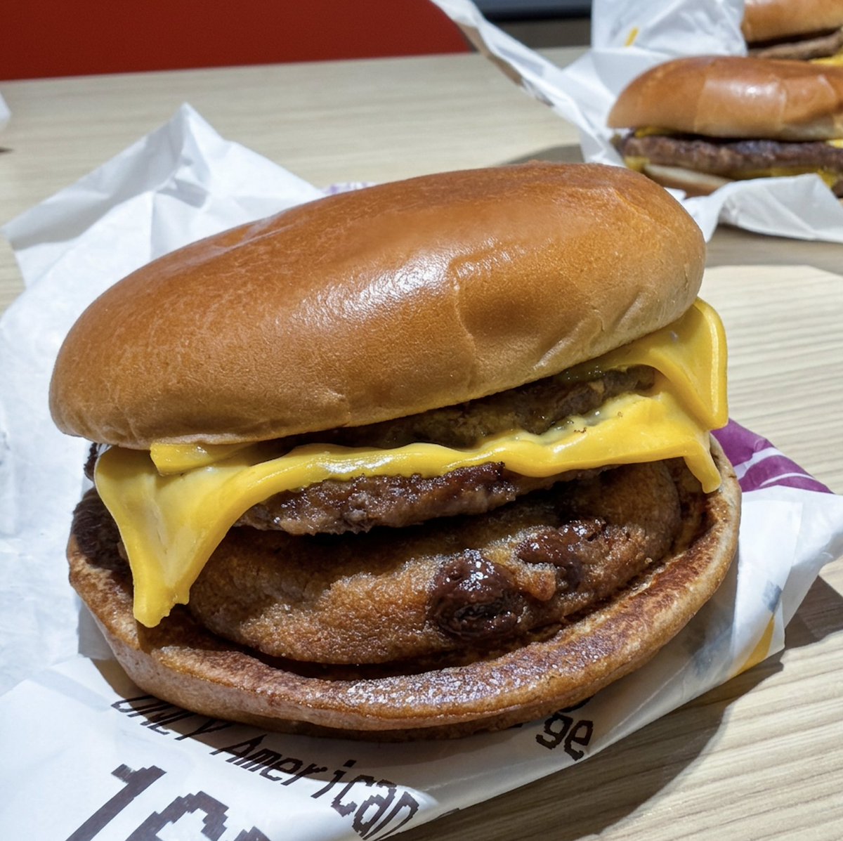 HuinGuillaume's tweet photo. A fan-made menu hack called the "Cookie McDouble" is going viral. A Double Cheeseburger (no mustard, ketchup or onions - and hopefully no pickles) with a chocolate chip cookie below the two beef patties. 

Someone called it a "masterpiece" after eating it.
Trying one tomorrow. https://t.co/vgmX5ZatpM