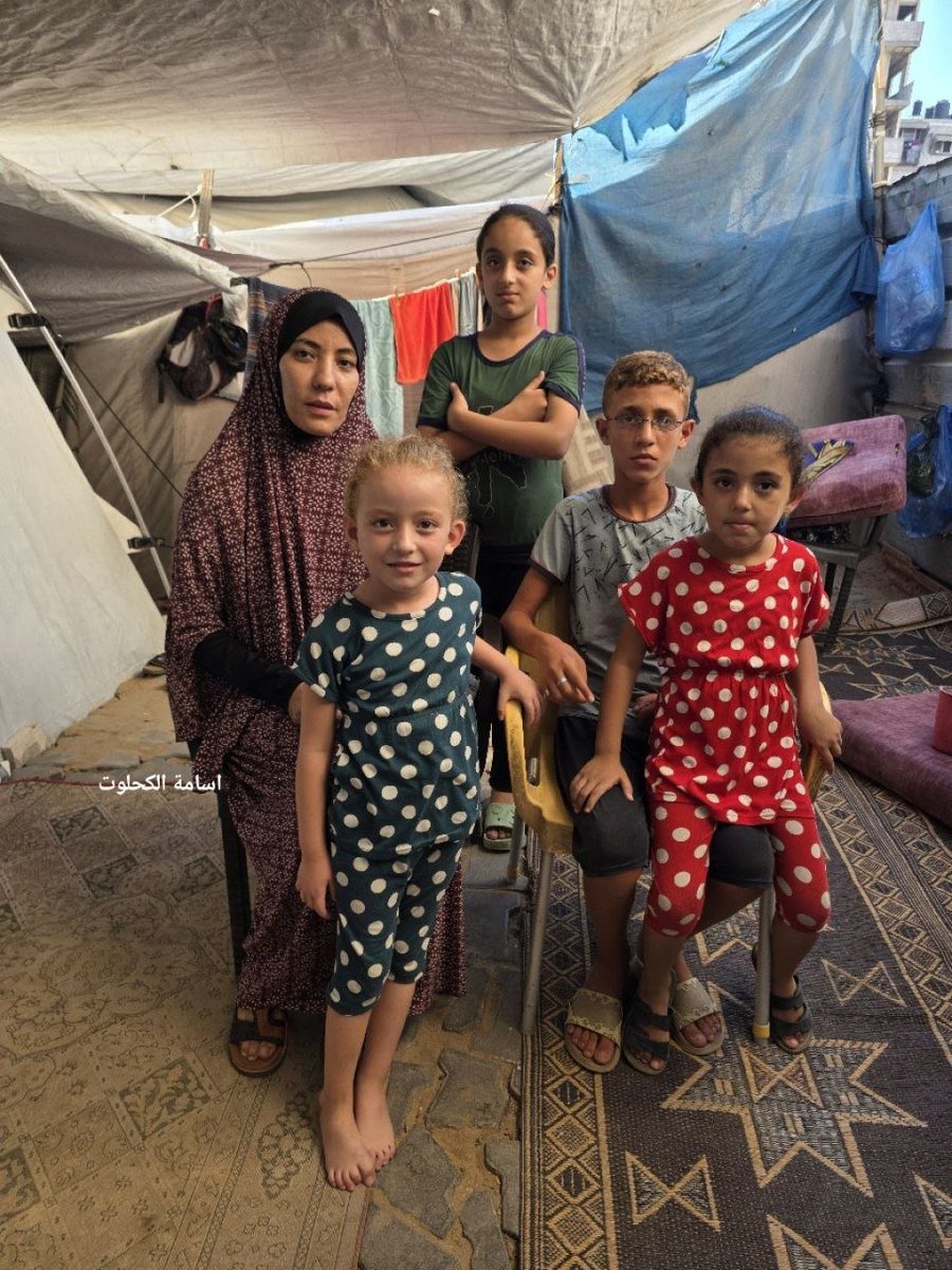 QudsNen's tweet photo. Four children from the Balah family lost both parents during the Israeli genocide in Gaza and now live with their aunt in a tent in Gaza City.

Their father had gone to collect flour from his in-laws' home west of Gaza City, accompanied by his wife and eldest son. Before they reached the house, a missile struck them, killing the father and injuring the mother and their son. 

A second missile then struck, killing the mother and leaving their son critically wounded. He spent more than a month in intensive care and continues to suffer from his injuries.

📷 Osama Kahlout