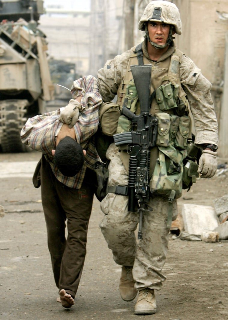 BenedictLynx's tweet photo. US Marine from the same unit with another detainee. https://t.co/RViUysMguC