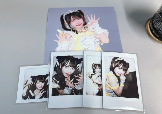 A collection of polaroid-style photocards showing a smiling young woman in various cute outfits and hairstyles.