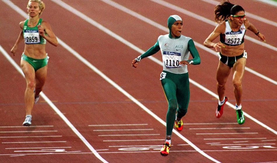 Jason_AW's tweet photo. 26 years ago today: Cathy Freeman, 110,000 flashbulbs capturing the moment, one Olympic Stadium in Sydney — and me filing this report on deadline as it happened. Some things you never forget. 🇦🇺

📸 @AthleticsImages

➡️ https://t.co/xH9omtJYrA https://t.co/cR5JMvrvnD
