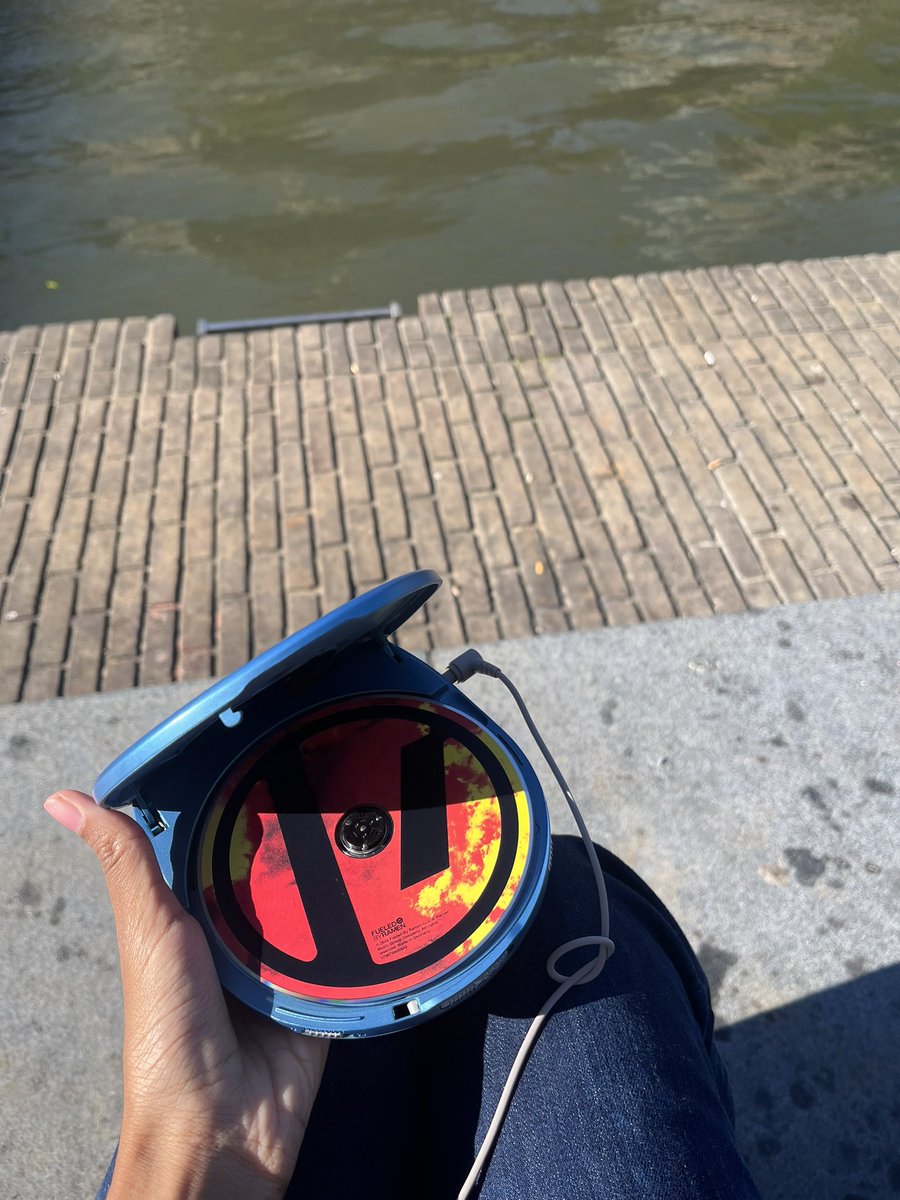nicontheniners's tweet photo. choose your partners wisely cause one day i told my boyfriend i used to have a discman as a kid and i missed the feeling of listening to music in that way and now im sitting in the sun like this https://t.co/JpvQa3Pykh