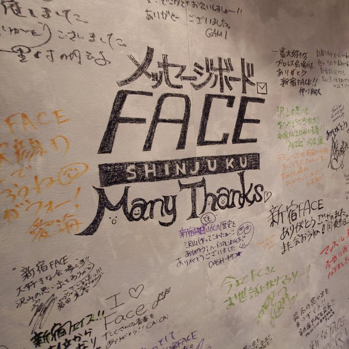 A wall covered in handwritten messages and signatures in multiple languages, with 'FACE SHINJUKU Many Thanks' prominently written in the center.