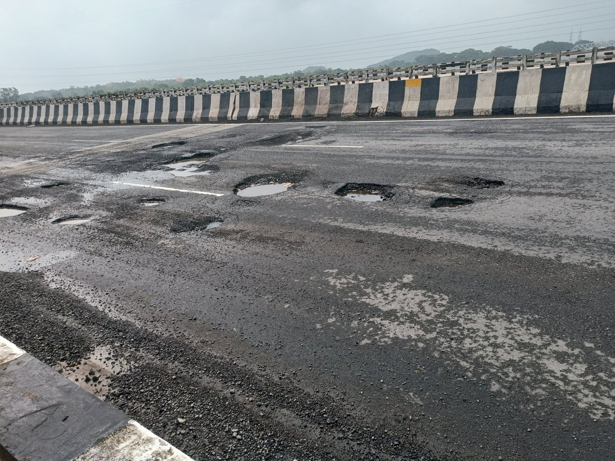 Prasad0x's tweet photo. 🚨 URGENT: NH-16 at Rushikulya Bridge , Ganjam is in terrible condition. Large potholes are forcing vehicles to slow down and weave around them. At night this is a serious accident risk. Please repair this stretch immediately. @NHAI_Official @nhai_ro @nitin_gadkari @MohanMOdisha https://t.co/fEaHib5zxX