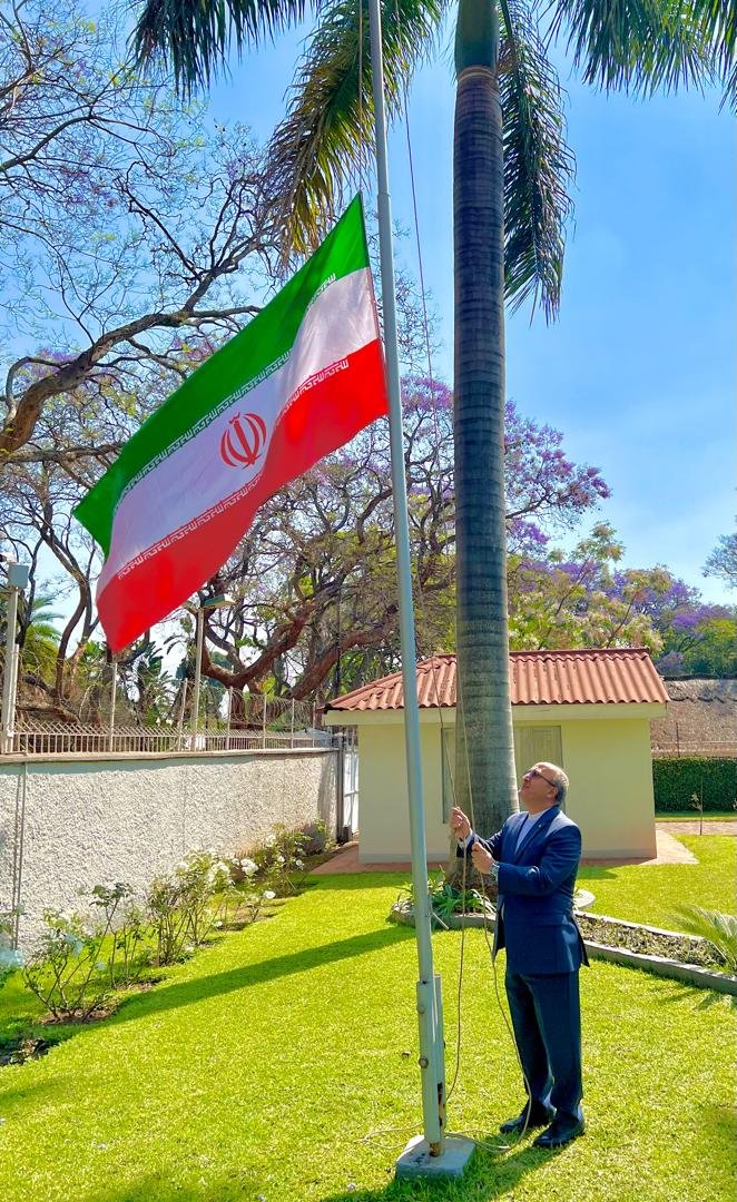 IRANinZIMBABWE's tweet photo. On the occasion of “National Flag Day Celebration”, we, too, once again hoisted the beautiful tricolor flag of the Islamic Republic of Iran. May our country endure and stand firm forever. https://t.co/2yDf7EVcqT