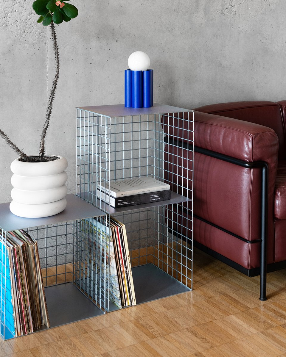ClarkLysonmz4's tweet photo. A beautiful composition of two CADY tables in zinc blue, a blue ROMANA lamp, and an iconic Le Corbusier sofa by Cassina—balancing design, function, and color. https://t.co/uqzDMAuarh