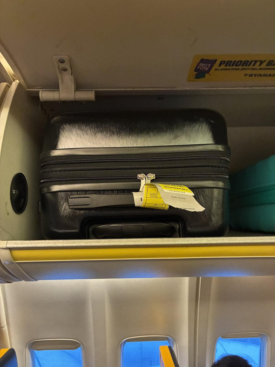 steph_pottz's tweet photo. @Ryanair absolute daylight robbery. I was charged £75 for a carry on case that was “too big” for the over head locked and needed to be put in the hold. No one took it from me and look, it fits perfectly into the locker. Disgrace. Make it make sense. I demand a refund. Ridiculous. https://t.co/ofFkGlbNqb