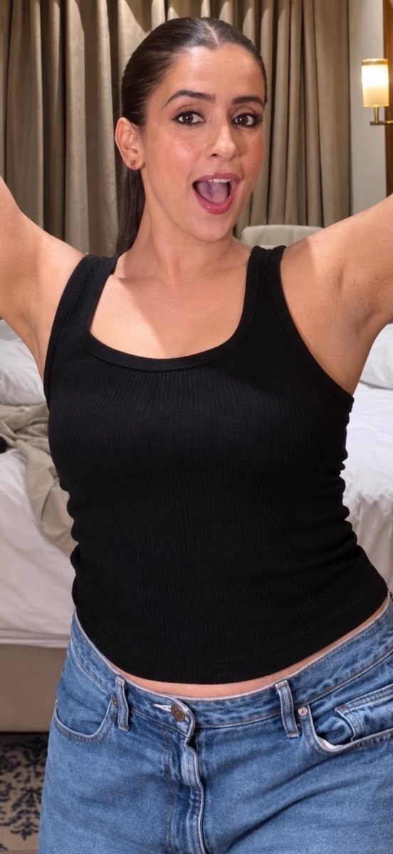 Vk82651042's tweet photo. Arms up, black tank glued to her, midriff out, that face like she knows exactly what you’re looking at. She didn’t raise her arms for the video. She raised them for the comments. First thing you noticed? https://t.co/xYtsOJq5bQ