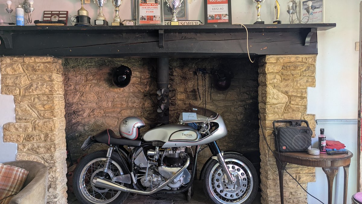 beardedbikez's tweet photo. Trying to convince the "real boss" that we need to have a fireplace like this but, as of yet to no avail. Any tips on how to get this over the line? 

Does anyone else have a bike in their house? Let's see below 

#motorcycle #MotorcycleLife #gonnatakesomeconvincing https://t.co/JBHSDbQzlk