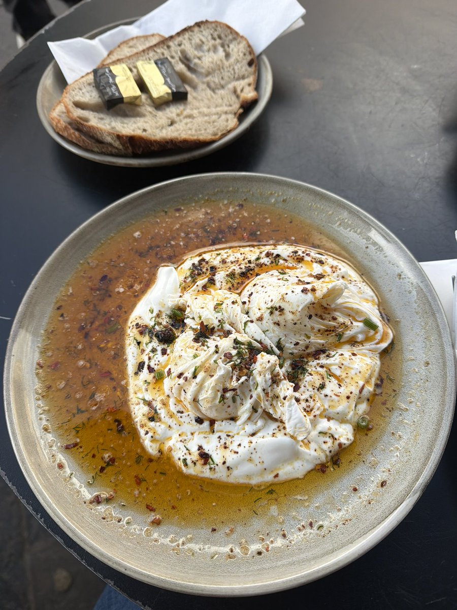 pusheenbakes's tweet photo. had lunch w my friend havent seen her since like april 
Got sourdough and turkish eggs on yoghurt i cant remember what exactly it was called. also got a yummy bean salad on the side https://t.co/x0H4Me9kNc