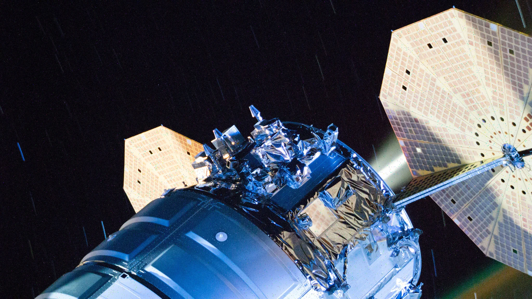 Northrop Grumman’s Cygnus XL cargo spacecraft fires its engines while berthed to the Unity module, lifting the International Space Station’s orbit on Aug. 27, 2026.