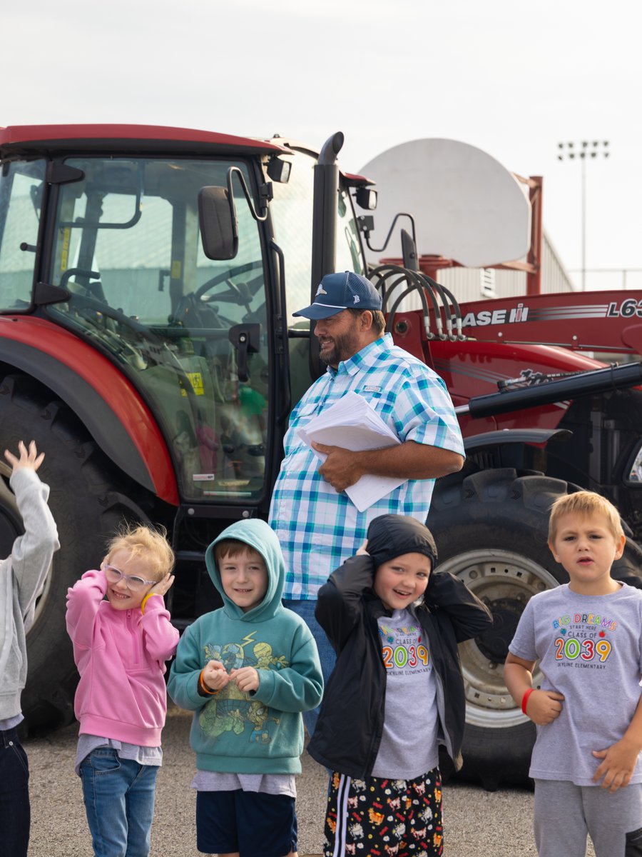 sfccmo's tweet photo. 🚜 Big Rig Day at Skyline Elementary!

Today, SFCC Farm Manager Tye Jones rolled up in a college tractor to give kindergarteners an up-close look at agriculture. We're grateful to build strong K–12 relationships and inspire learners of all ages! 💙 https://t.co/ZTYn3ljzqI