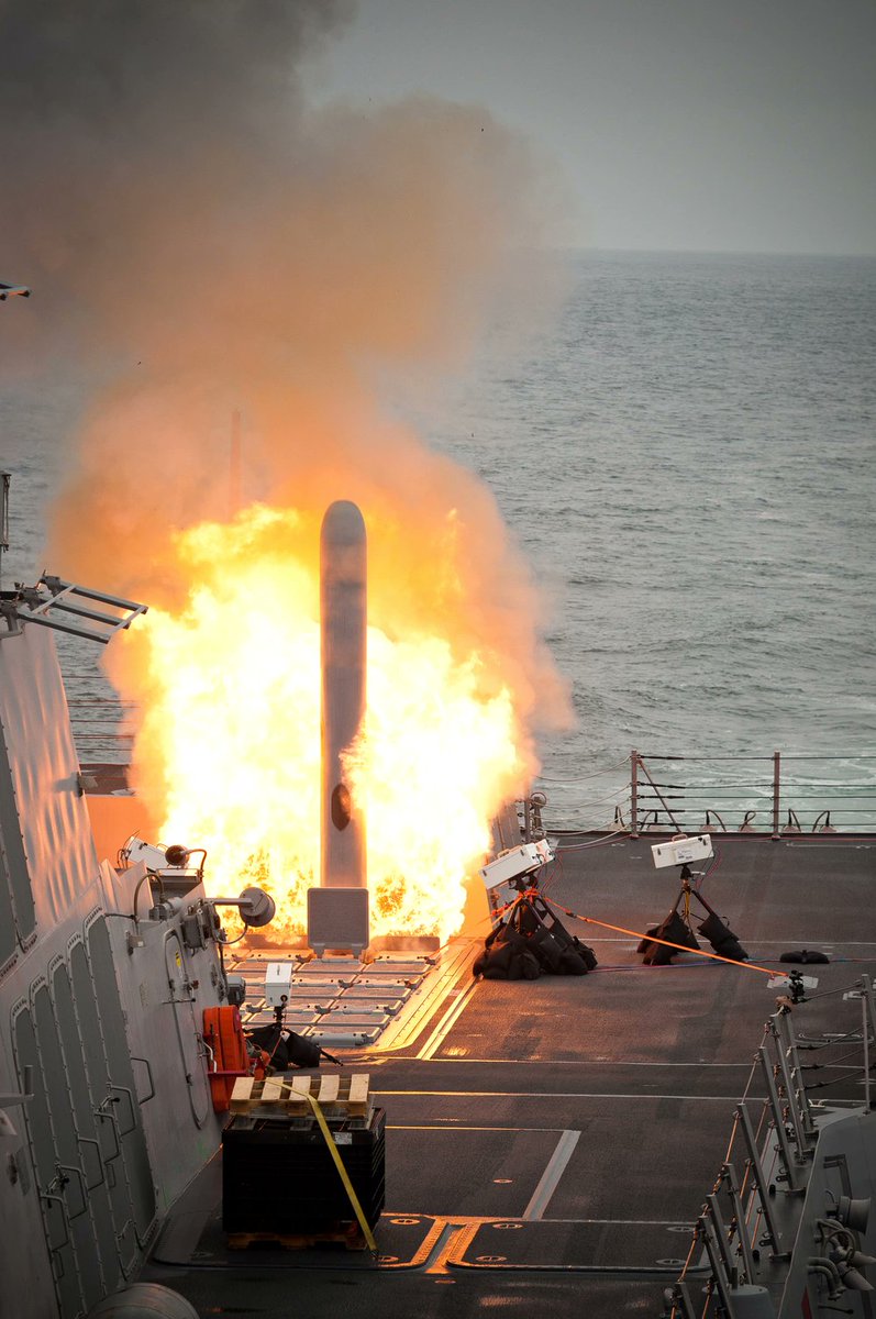 Arkasiraee's tweet photo. A Tomahawk can sit sealed inside its launch canister for years. Its jet engine has never run, and its flight battery isn't sitting there permanently charged. 

When the missile is finally selected, the ship supplies power, loads the mission details and wakes up a machine designed around the assumption that almost everything has to work correctly the first time.

Then it changes character completely. A dormant lithium thermal battery activates, and a Mk 135 booster burns roughly 146 kg of solid propellant to throw the 1.5 tonne launch package out of the ship. 

Within a few seconds the wings are out, the booster is gone and a tiny Williams F415 turbofan has taken over. Once running, even the battery is no longer needed, a generator driven by the engine powers the missile's electronics.

The F415 produces only about 650 lb of thrust. That sounds nowhere near enough for something this heavy, but the engine isn't carrying the Tomahawk. 

At cruise speed its small wings generate the lift, the turbofan only has to replace the drag. Roughly 500 kg of dense JP-10 fuel gives it the endurance to keep doing this for more than 1,000 km while flying extremely low.

Tomahawk has also kept getting smarter without changing that basic architecture. Modern versions can be retargeted after launch, loiter, and even send back an image from an area they pass over.

More than 2,300 have been fired in combat since 1991.

That may explain its longevity better than any specification. America has spent four decades upgrading the electronics, navigation and payloads inside Tomahawk because the machine underneath still works just fine. 

With those upgrades, it remains one of the most capable weapons in the subsonic cruise missile class.