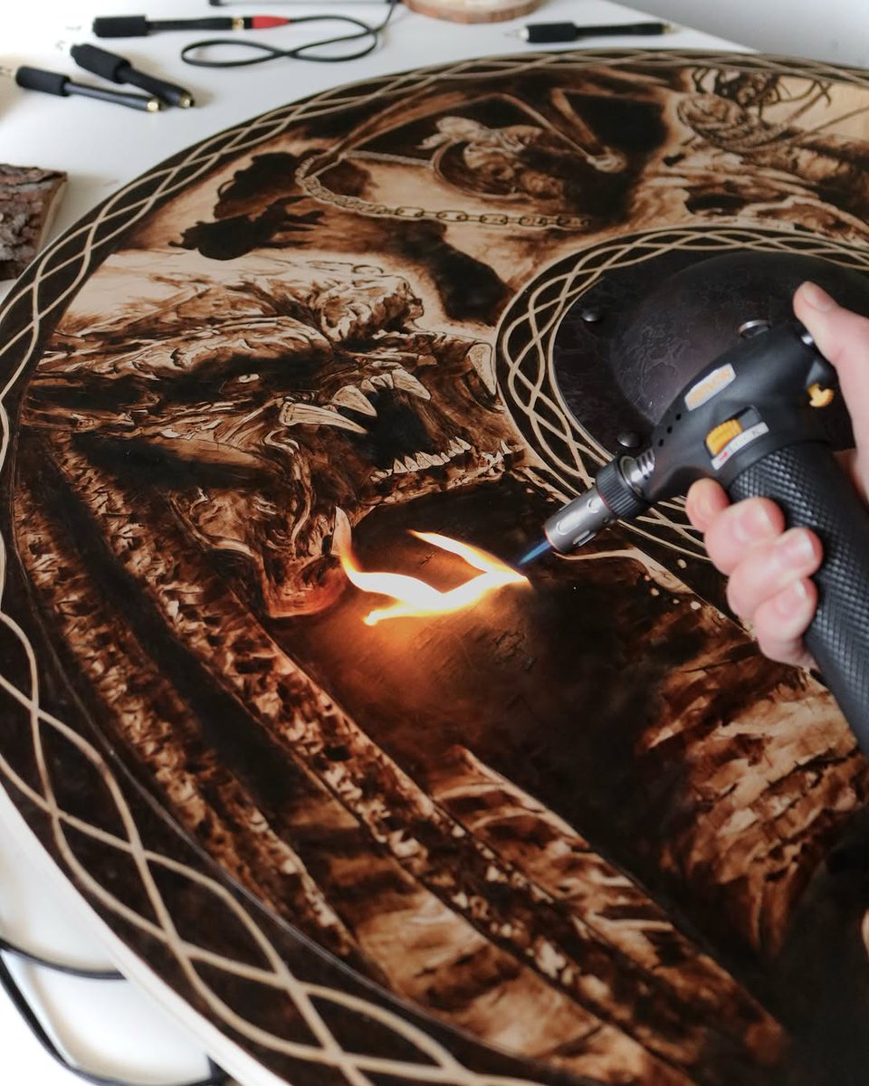 pindepoz's tweet photo. Viking shield woodburning for  ⚔️🛡️. Predator: Killer of Killers is streaming now on Disney+. https://t.co/P982X0LZUU
