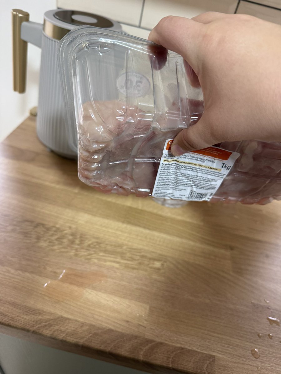 georgiaprickle's tweet photo. @sainsburys tried using DM but getting repeated automated response. I’ve just unpacked my in store shop &amp; noticed my chicken is leaking everywhere - meaning it’s open somehow and is unsafe for consumption. Please help rectify this issue. https://t.co/ZkoNfrlKaZ