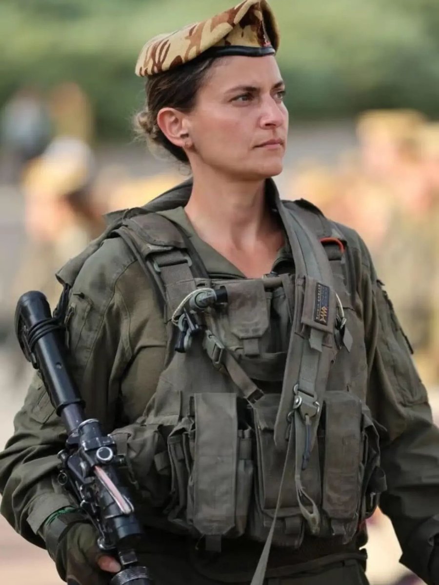 afshineemrani's tweet photo. “That’s it. This is where I die. Right here, exactly where I’m standing now.”
​On the morning of October 7th, Lieutenant Colonel Or Ben Yehuda, Commander of the Caracal Battalion, looked up to see a nightmare unfolding: hundreds of terrorists charging over sand dunes in pickup trucks and motorcycles. Behind her stood just 12 of her fighters. Outnumbered, outgunned, and staring directly into the abyss.
​Most people would freeze. Or Ben Yehuda turned to her soldiers, looked death in the face, and smiled.
​“Come on, let’s tear them apart.”
​What followed was hours of pure, relentless valor. Firing until the barrels burned. Taking out trucks with anti-tank missiles. Killing a terrorist leaping at her from point-blank range with a split-second trigger pull. Guiding a lone tank with hand signals through thick smoke, coordinating rescue choppers under fire, and shielding the kibbutzim behind them with nothing but pure grit and unyielding willpower.
​When the smoke finally settled, she walked slowly down the line of fallen soldiers—angels and lions who gave everything so others could live—gently stroking their faces, whispering apologies, and softly closing their eyes.
​Between an overwhelming horde of terror and thousands of sleeping civilians stood twelve fighters led by a woman who refused to yield an inch of ground.
​Remember this face. Remember this name.
Lieutenant Colonel Or Ben Yehuda. A warrior who looked into the dark and answered it with fire.
​.
.
.
#Heroism #IronSwords #Caracal #TrueBravery #Inspiration #Leadership #Unbroken #HonorTheFallen