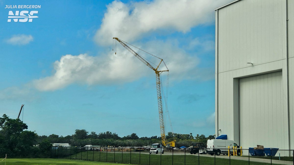 julia_bergeron's tweet photo. Blue Origin is busy over at the Rocket Park. The former Ares 1 LM-1 has moved to be staged outside of MILA where the GS2 test area is well underway. Another crane has risen on the skyline. The Project Horizon building should take shape relatively fast with a ton of steel already staged.

📷 @NASASpaceflight