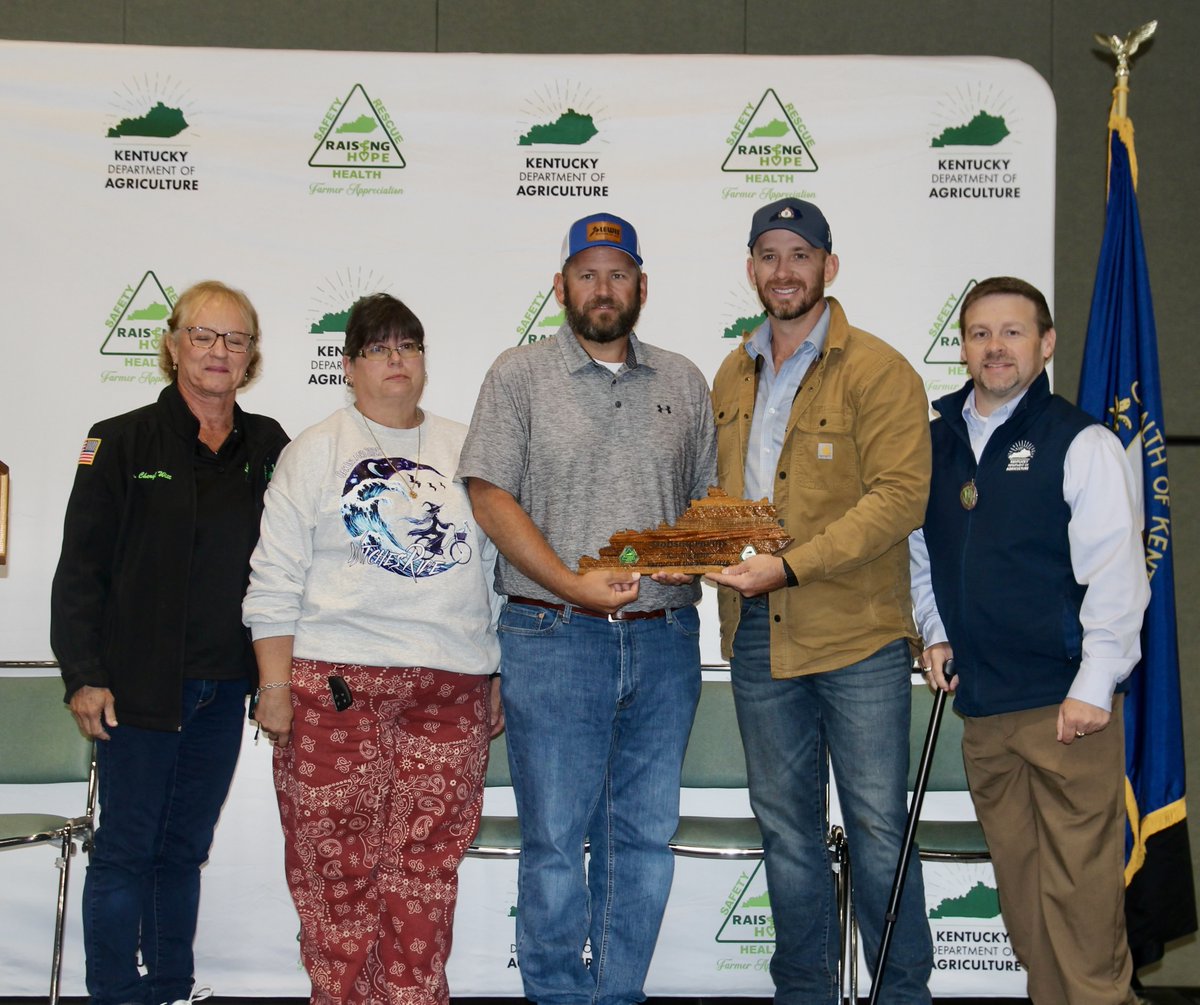 kentuckyag's tweet photo. Through tears, hugs, and a few smiles, the family of the late Dale Dobson accepted the Kentucky Farmer of the Year award for Dobson Farms at the Farmer’s Appreciation and Awards Day. https://t.co/hlefrctFeX