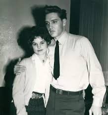 LiberianGirl779's tweet photo. 14yrs old Pricilla and Elvis: “We had a nightly ritual. At about ten or eleven, Elvis would glance at me and look toward the stairs. Then, naively assuming that nobody knew where I was headed, I'd casually proceed to his bedroom, where I'd lie on his bed, impatiently waiting for him to appear. When he joined me, he'd lie as close to me as he could. "I love you," I whispered. Sometimes Elvis would enter his bedroom in high spirits. I longed for those nights when he'd shut off the lights and lie close beside me. "Sweetness," he would say, putting his arms around me.
"You're so pretty, Honey." And then we'd kiss long, deep, passionate kisses, and his caresses would leave me weak with desire.
Nights when his mood was calm and peaceful, he would describe his ideal woman and tell me how perfectly I fit this image.”