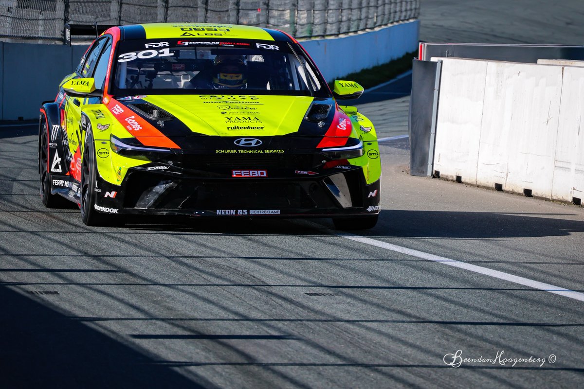 scottmoral29863's tweet photo. The pit lane has never looked this loud. The bright yellow Hyundai Elantra TCR diving back into the pits after another hard stint. https://t.co/q6ncrTygt3