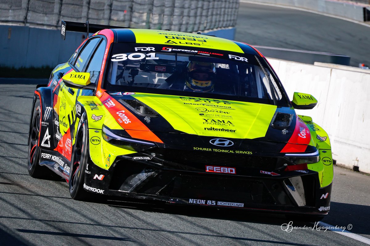 scottmoral29863's tweet photo. The pit lane has never looked this loud. The bright yellow Hyundai Elantra TCR diving back into the pits after another hard stint. https://t.co/q6ncrTygt3
