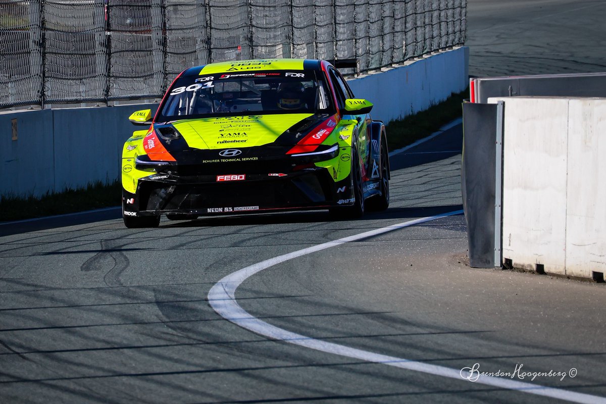 scottmoral29863's tweet photo. The pit lane has never looked this loud. The bright yellow Hyundai Elantra TCR diving back into the pits after another hard stint. https://t.co/q6ncrTygt3