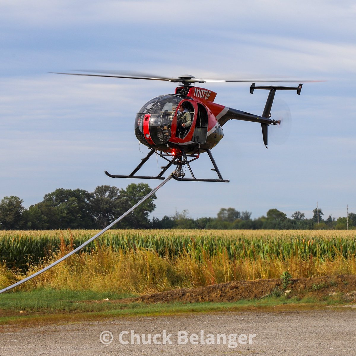NowHeresYou's tweet photo. Rotor-blade, LLC is in Bluffton/Ossian Indiana (Wells County) trimming trees along the railroad tracks. Finally saw the chopper fly. They had to move to a private farm due to an event at this location. #rotorbladellc #hughes500 #bluffton #ossian #norfolksouthern @rotorbladellc https://t.co/8PPcHJPmIg