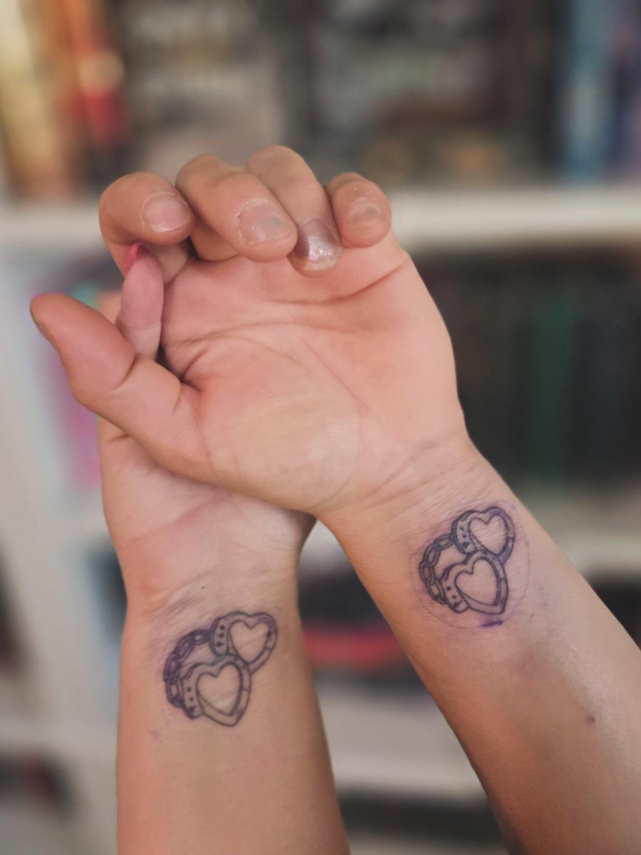 BlakeEfurd's tweet photo. Today @afregoso213 and I got matching tattoos to celebrate 17 years of marriage! Happy to be tied to this man forever. After all this time, I’m still into you. Thank you @ireland. ink, and happy first anniversary @yourstrulybookshop_! https://t.co/bznY3OF7vP
