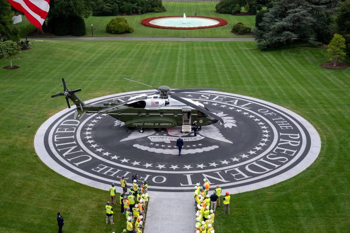 arva61138's tweet photo. The new helicopter landing pad, located on the south lawn of the White House, saw its first operational flight with a VH-92A Patriot helicopter from the U.S. Marine Corps. The helicopter took off from the pad, designated "Marine One," marking the beginning of its operational use.

The helicopter pad features a heated concrete base covered with granite slabs, on which the presidential seal is engraved. Sikorsky, the manufacturer of the VH-92A helicopter, funded the project, which cost approximately $6 million.