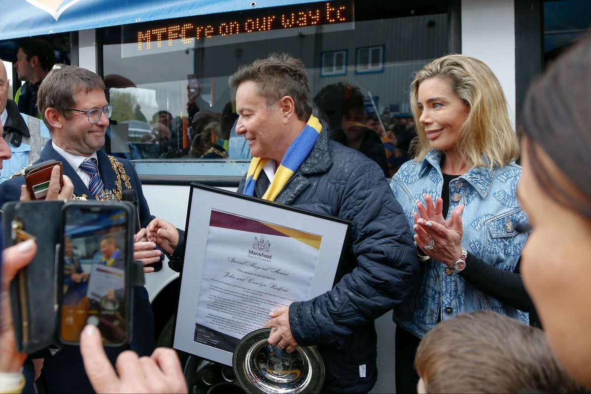 mansfieldtownfc's tweet photo. 🙌 We’re celebrating 16 years of the Radfords as owners of Mansfield Town.

👏 Thank you John &amp; Carolyn.

#Stags 🟡🔵 https://t.co/S55pdrXtuQ
