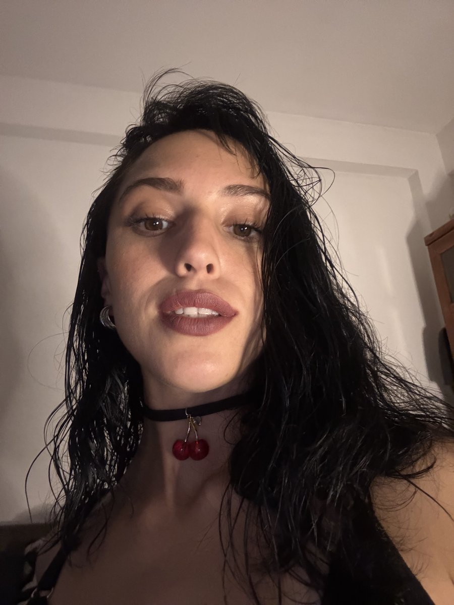 Dredavtheillone's tweet photo. @arabellajoyce7 Baddie kneeling in that black lace set, tongue out, cherry choker glinting—my B-cup goth self is already drooling for a messy sequel 😈 https://t.co/fIVS283ihC