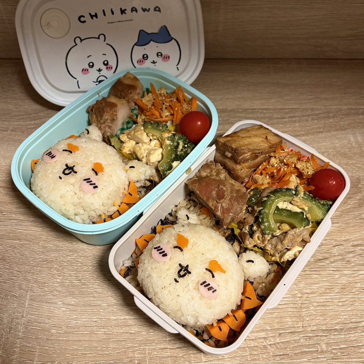 _cocco_ch's tweet photo. シーサー弁当つくった！

おかずは、ラフテー、ゴーヤチャンプルー、にんじんしりしり♪
シーサーちゃんのお顔の下には、ジューシーを敷き詰めてあります🍚

#ちいかわ
#シーサー
#キャラ弁 https://t.co/Telr3hwRVI