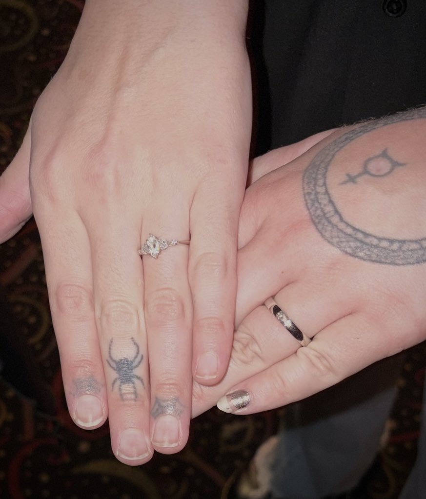 fangedfemme777's tweet photo. i proposed to my butch at an old local theater with a video compilation i made of us over the last five years and it was so perfect <3 https://t.co/7fVjHsKivC