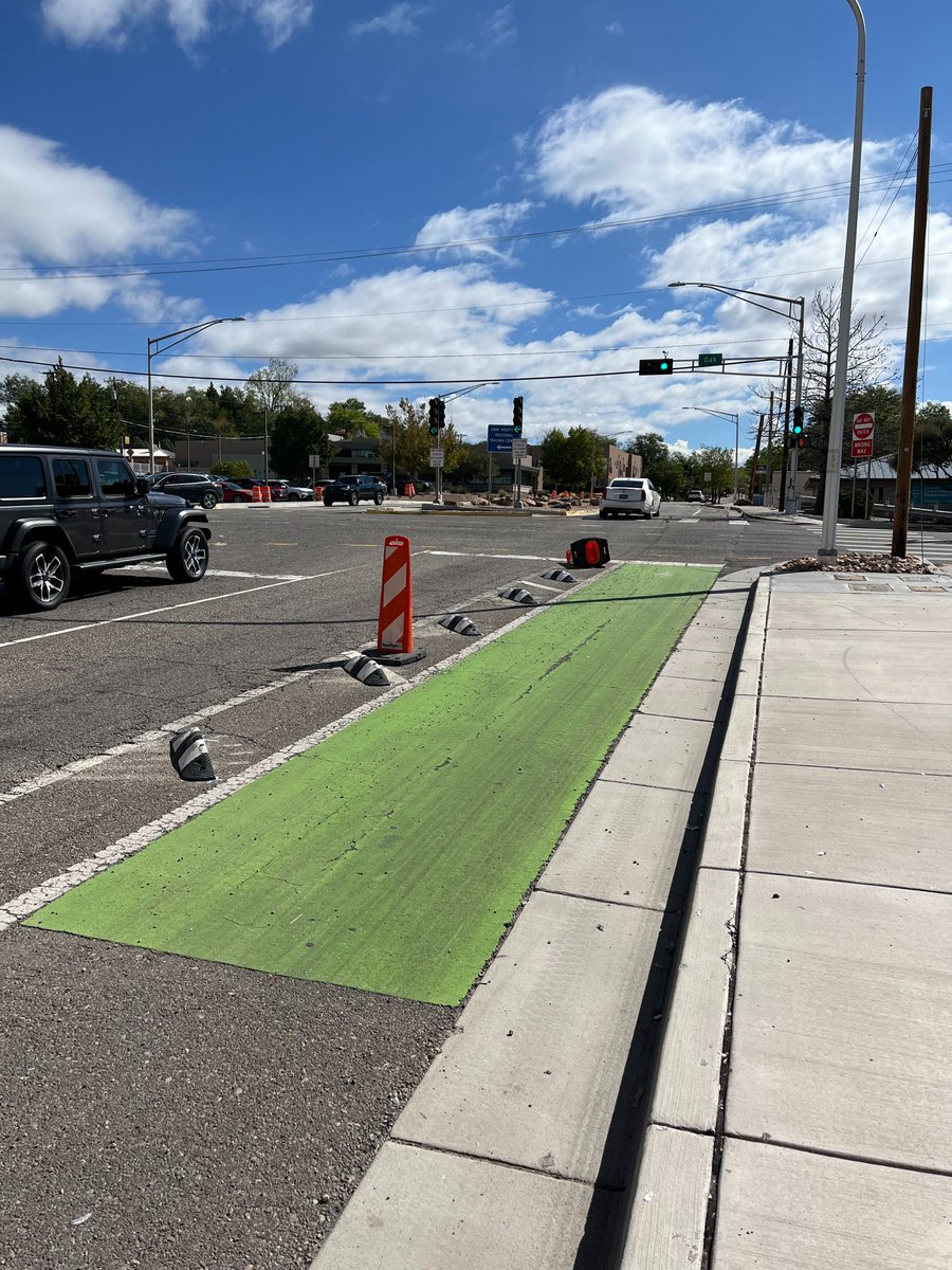 BikeABQ's tweet photo. The City's bike lane protection pilot project along MLK is taking shape. Check it out, and if you like what you see, contact your City Councilor and let them know.

More info: https://t.co/lG19eyJ8Hb https://t.co/8ZgIANW6Xy