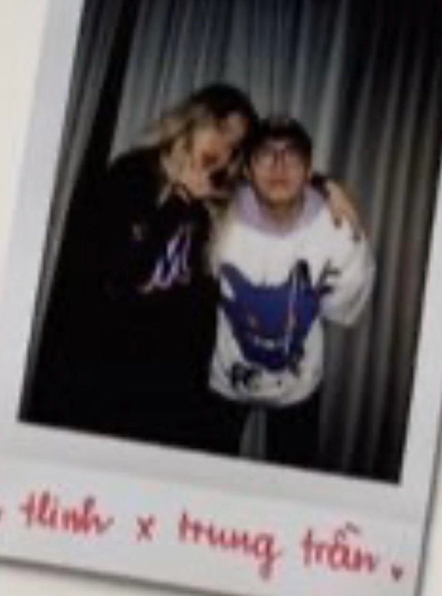 XXspla_Ai's tweet photo. That blonde chick on the left has a face so puffy it looks like a mule stomped it three times, makeup smeared like a dog chewed it off, wrapped in that black hoodie like some old hag that just crawled out of a grave, and she’s still clinging onto the guy like a desperate ugly bitch.
The scrawny four-eyed monkey on the right looks like a complete idiot, wearing that white hoodie with some cheap blue graphic like a homeless guy, short enough to be used as a doorstop, yet he’s posing all lovey-dovey. Makes you wanna slap both of them.
Together they look like the Ugly Ass Association holding a meeting, plastic as hell, fake as fuck from a mile away. I wanna flush this shitty Polaroid straight down the toile